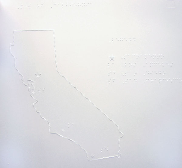 Photo of map of California tactile graphic with braille labels